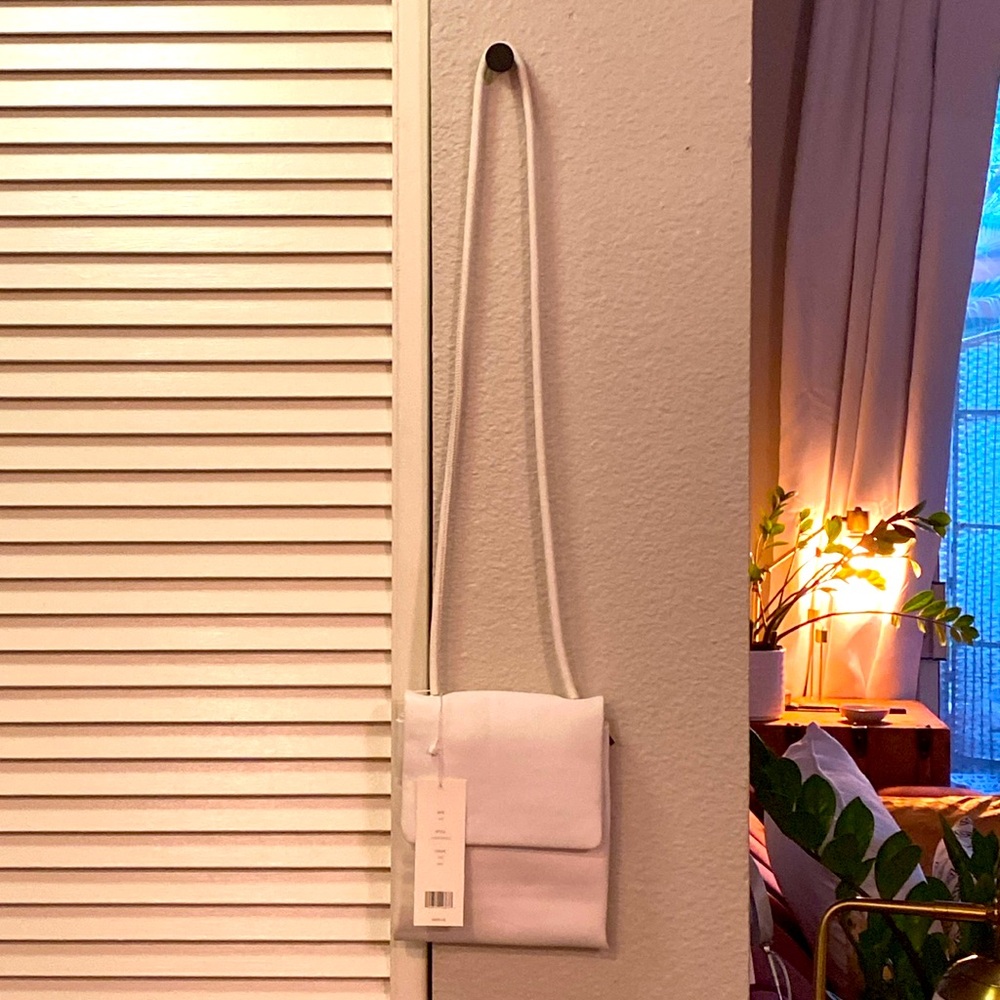 Vince Canyon White leather crossbody purse.